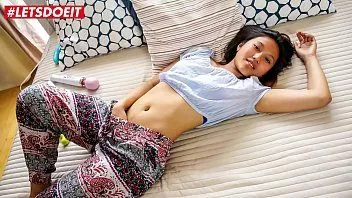 Play Asian young woman masturbates with vibrator and dildo